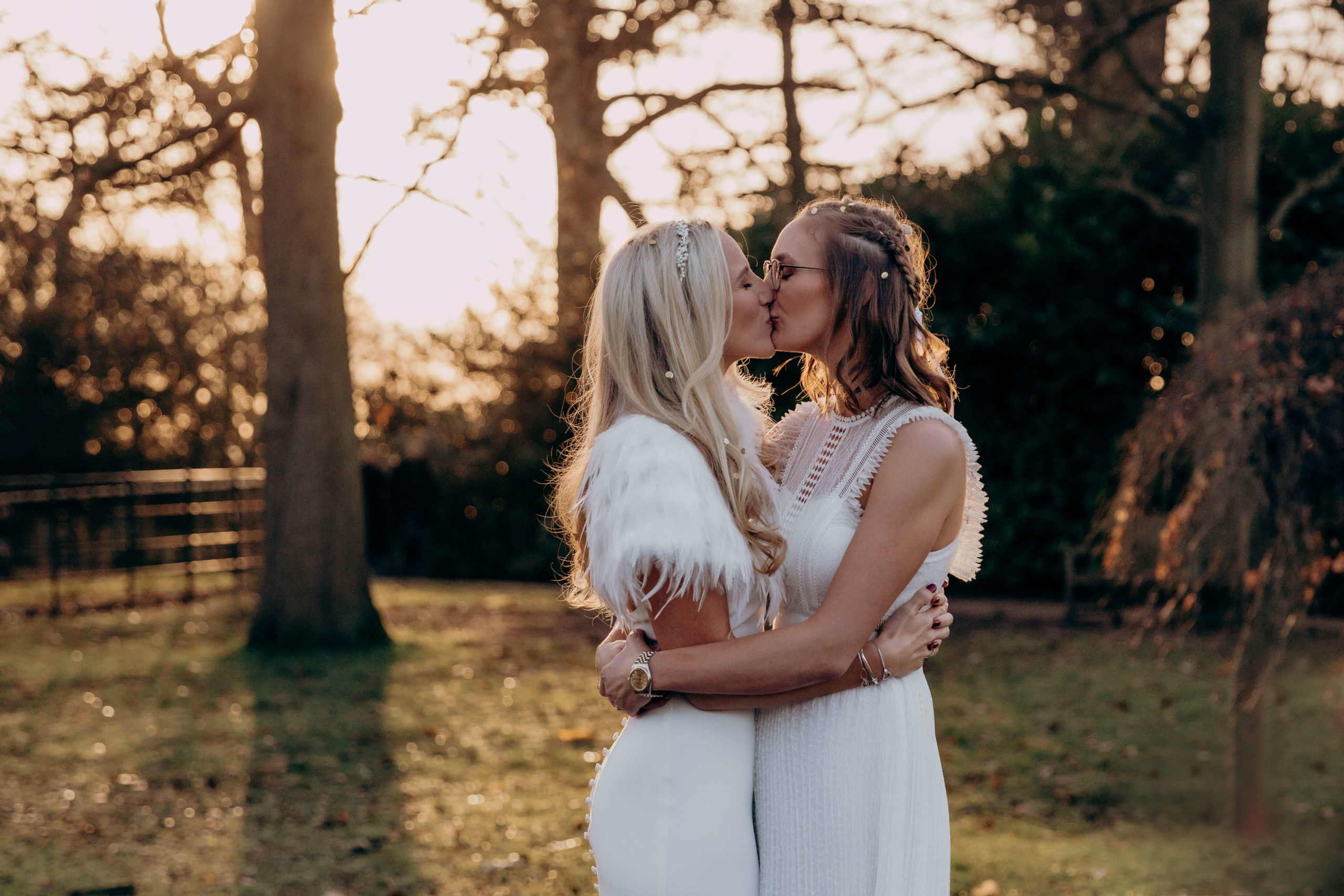 Claudia and Nicola kiss during sunset after their wedding ceremony in Richmond