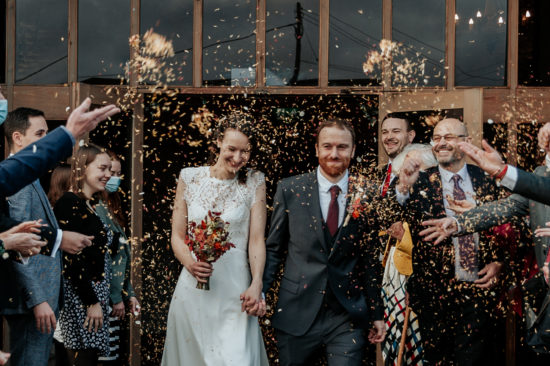 Kirsty & Aldous leave their ceremony in a flurry of confetti at Ufton Court
