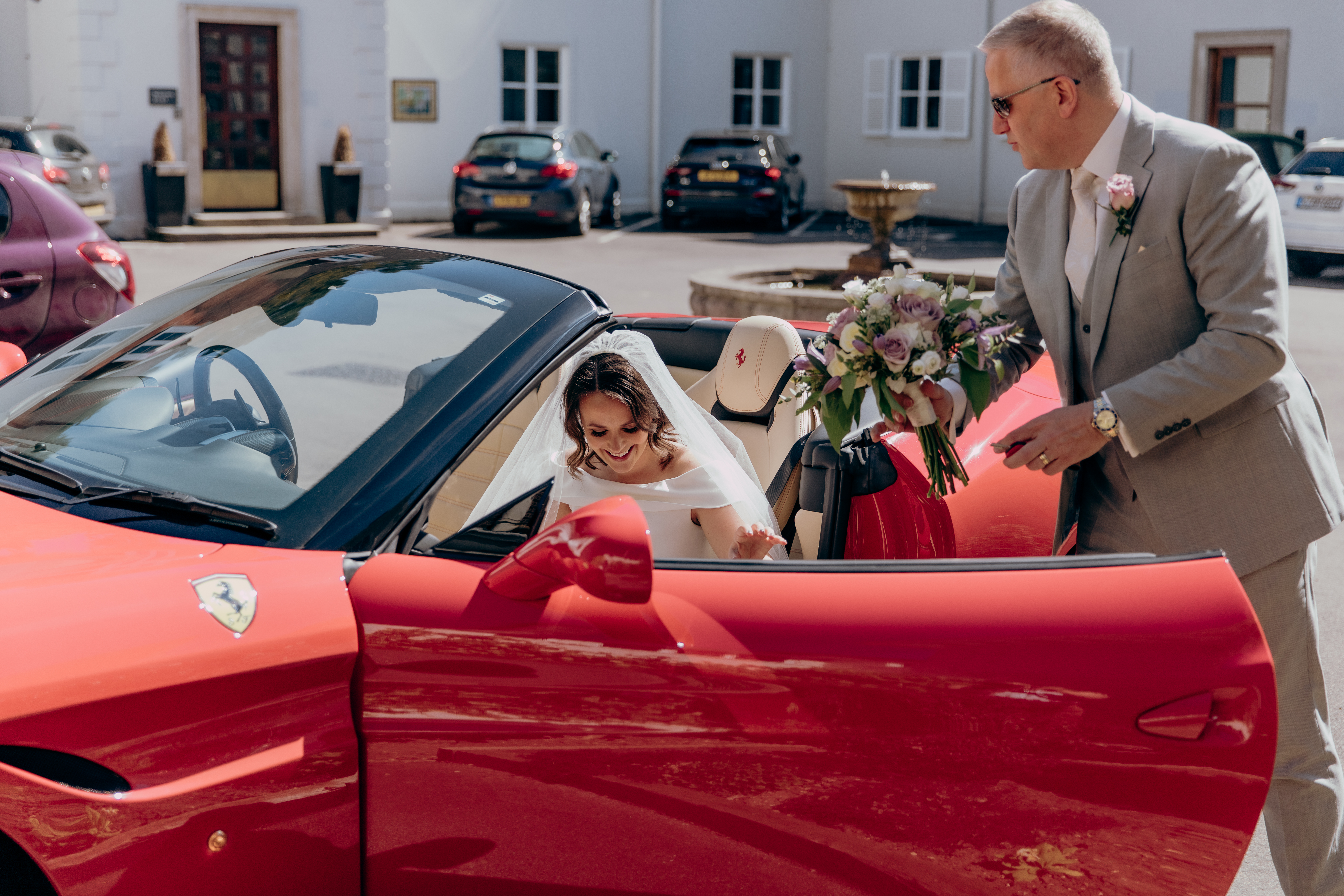 Laura arrives at Gorse Hill in her father's red ferrari