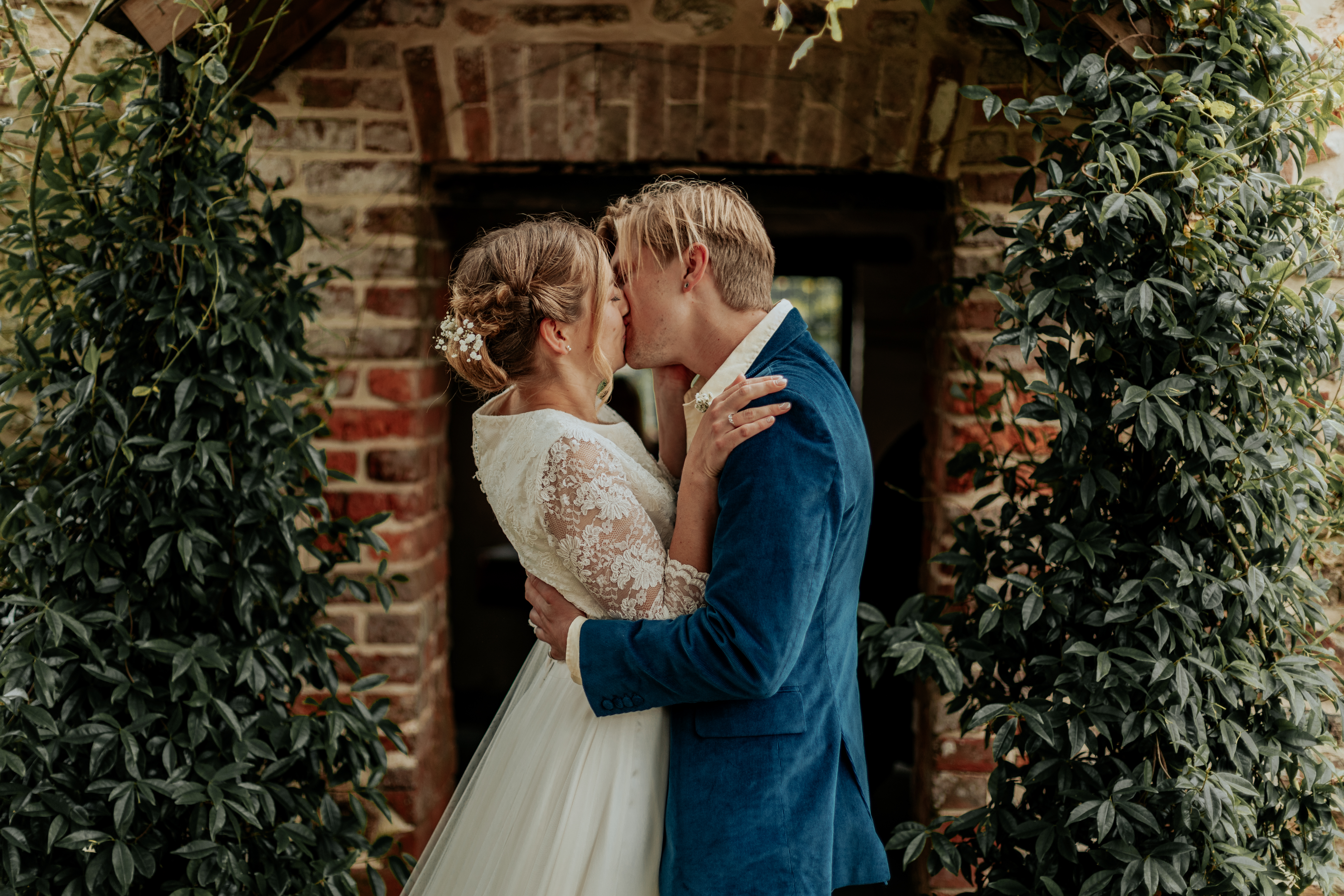 Sarah & Cameron kiss during their wedding ceremony