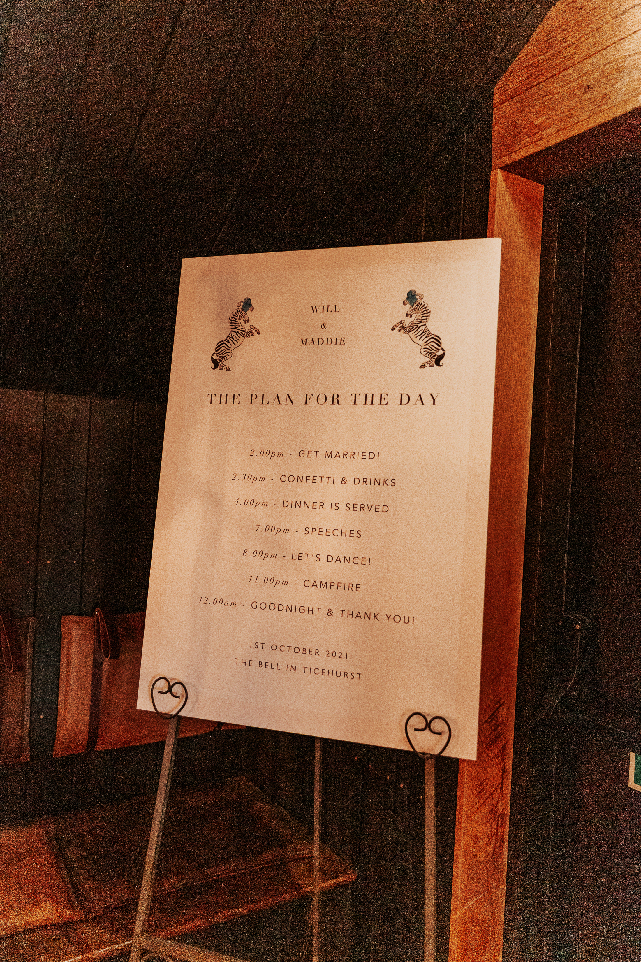 The order of the day for Maddie & Will's wedding, decorated with Zebras