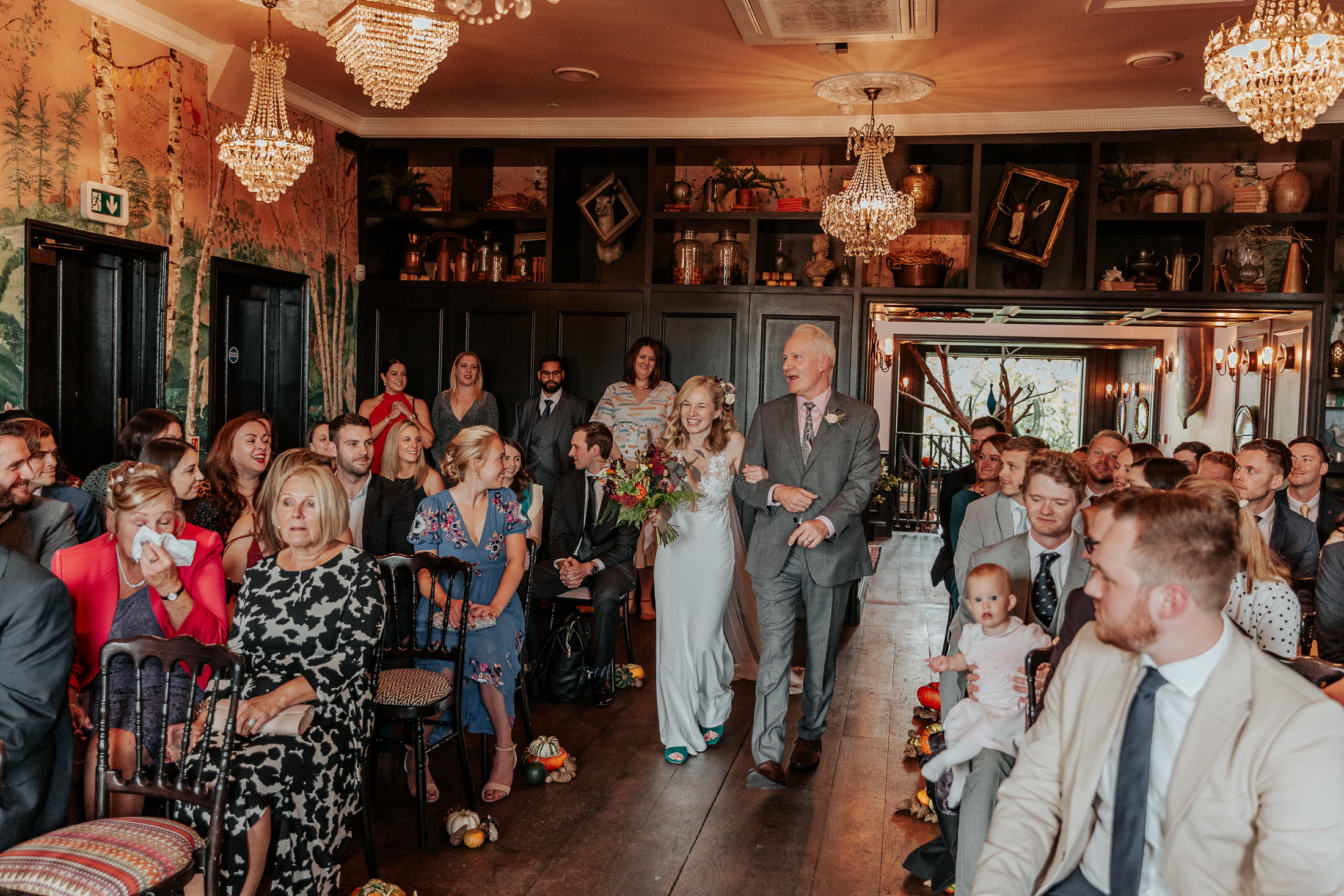 Maddie is walked down the aisle by her father