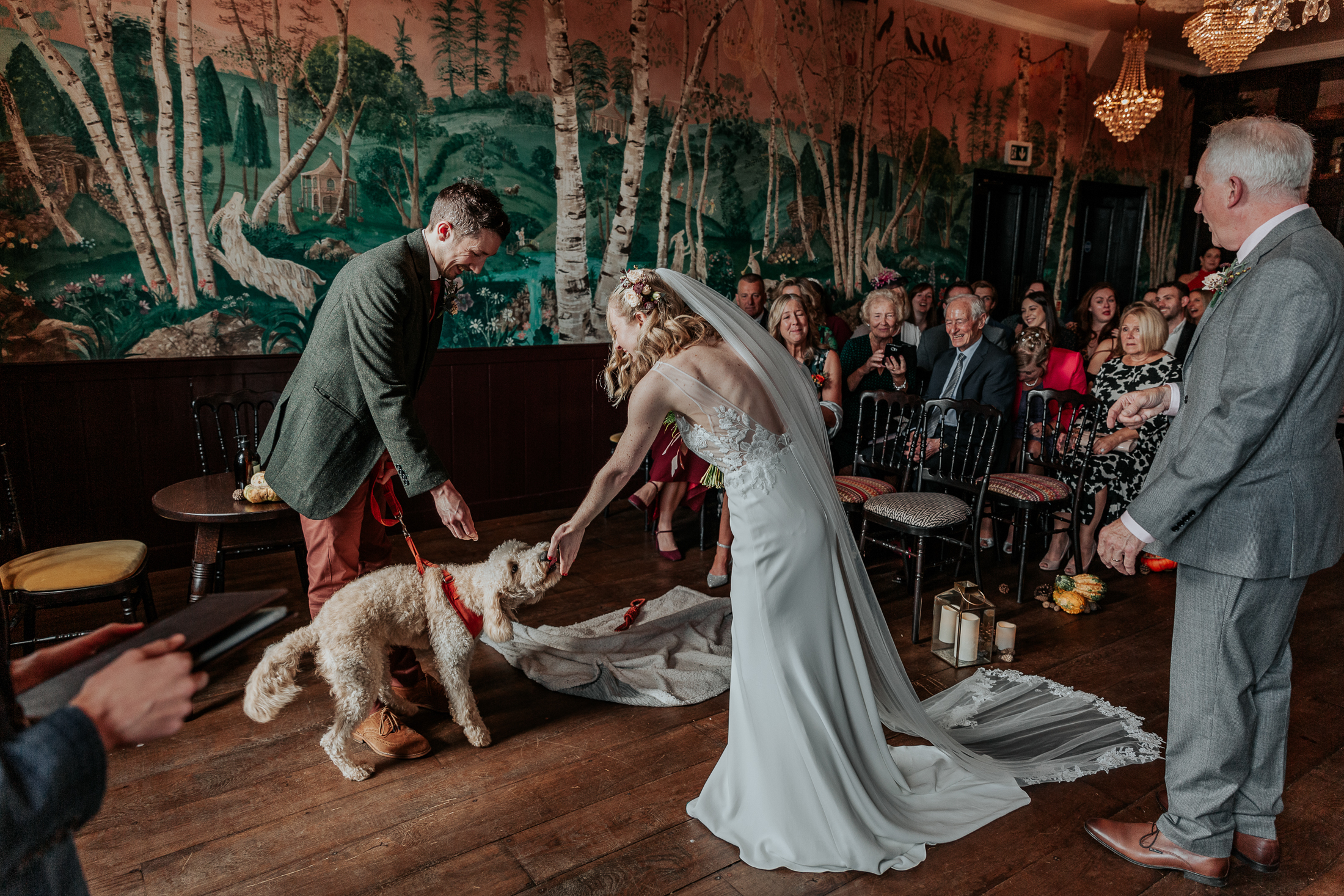 Maddie greets Will and Remi the dog as she reaches the altar at their wedding