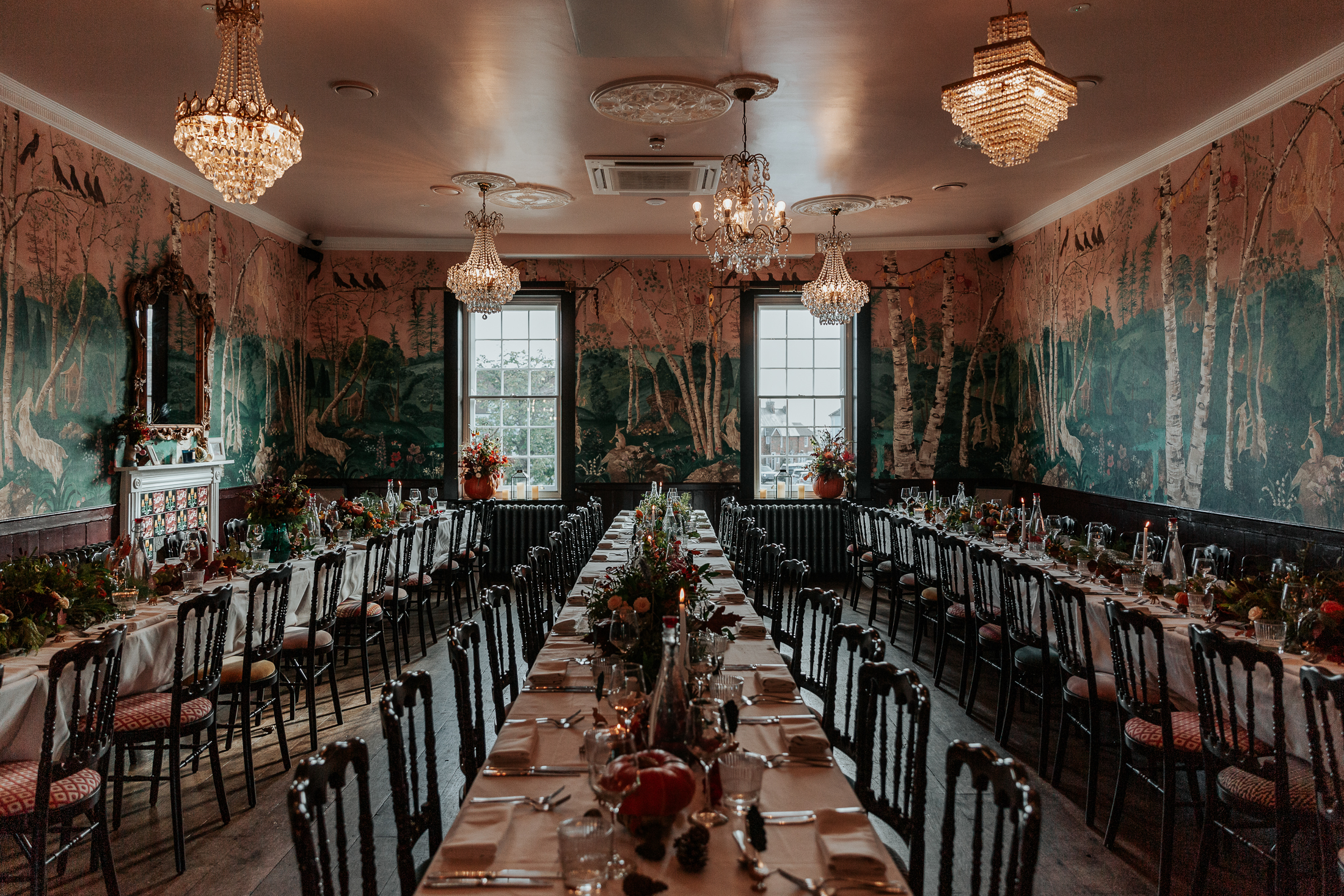 The ceremony room at The Bell in Ticehurst, set up for the wedding breakfast