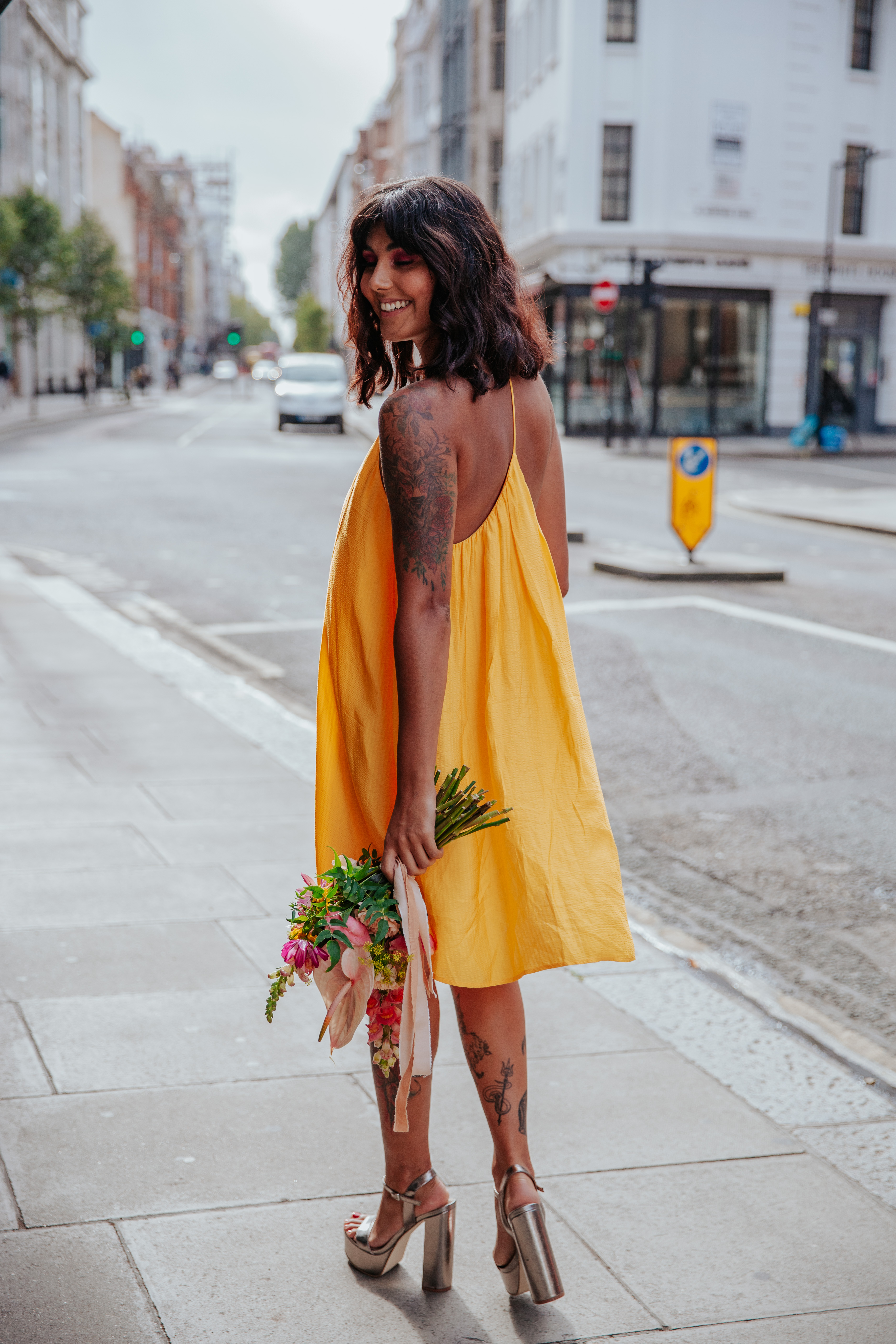 Meera on the street outside Mortimer House, the venue of her London microwedding