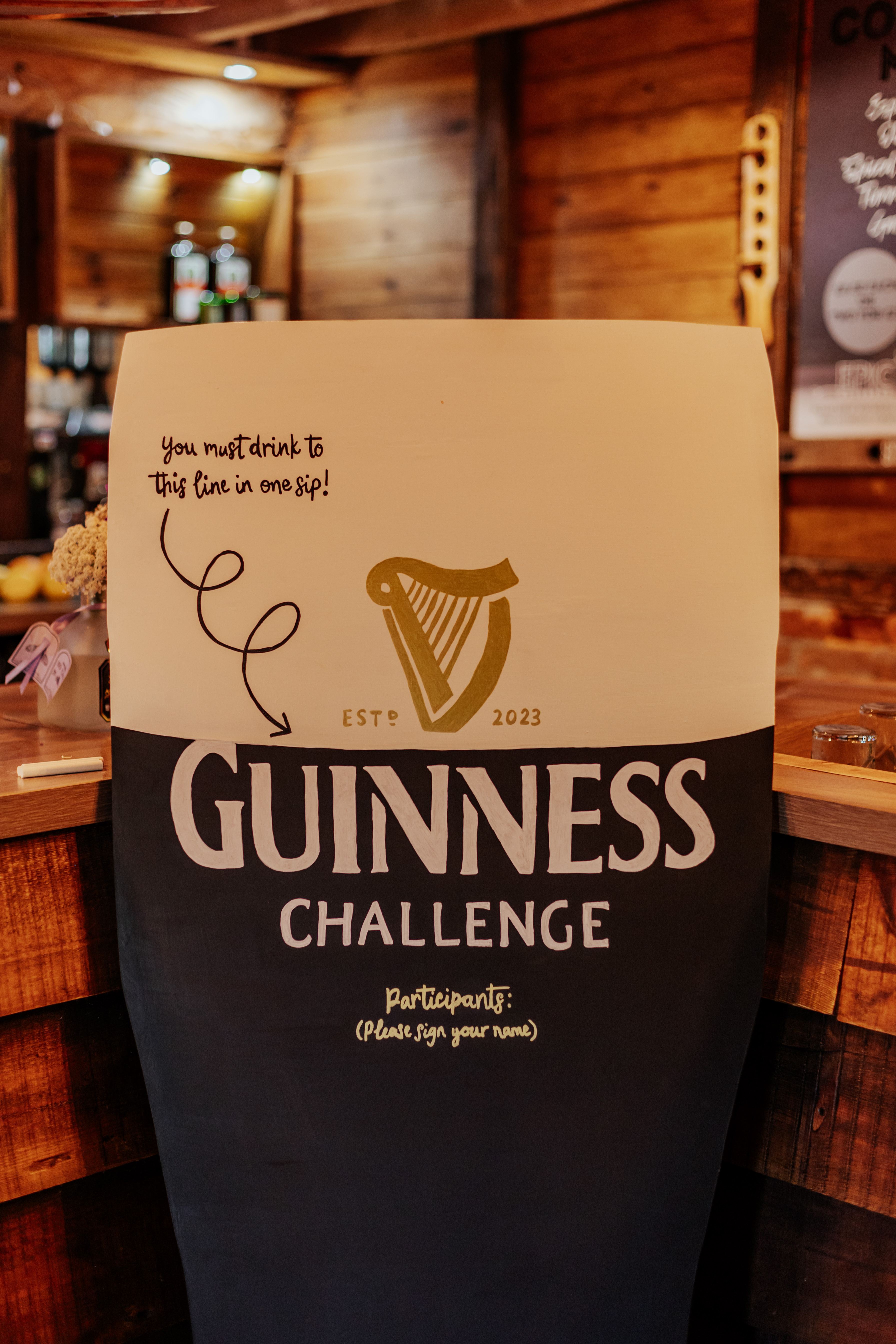 A giant Guinness challenge sign for their guests to sign