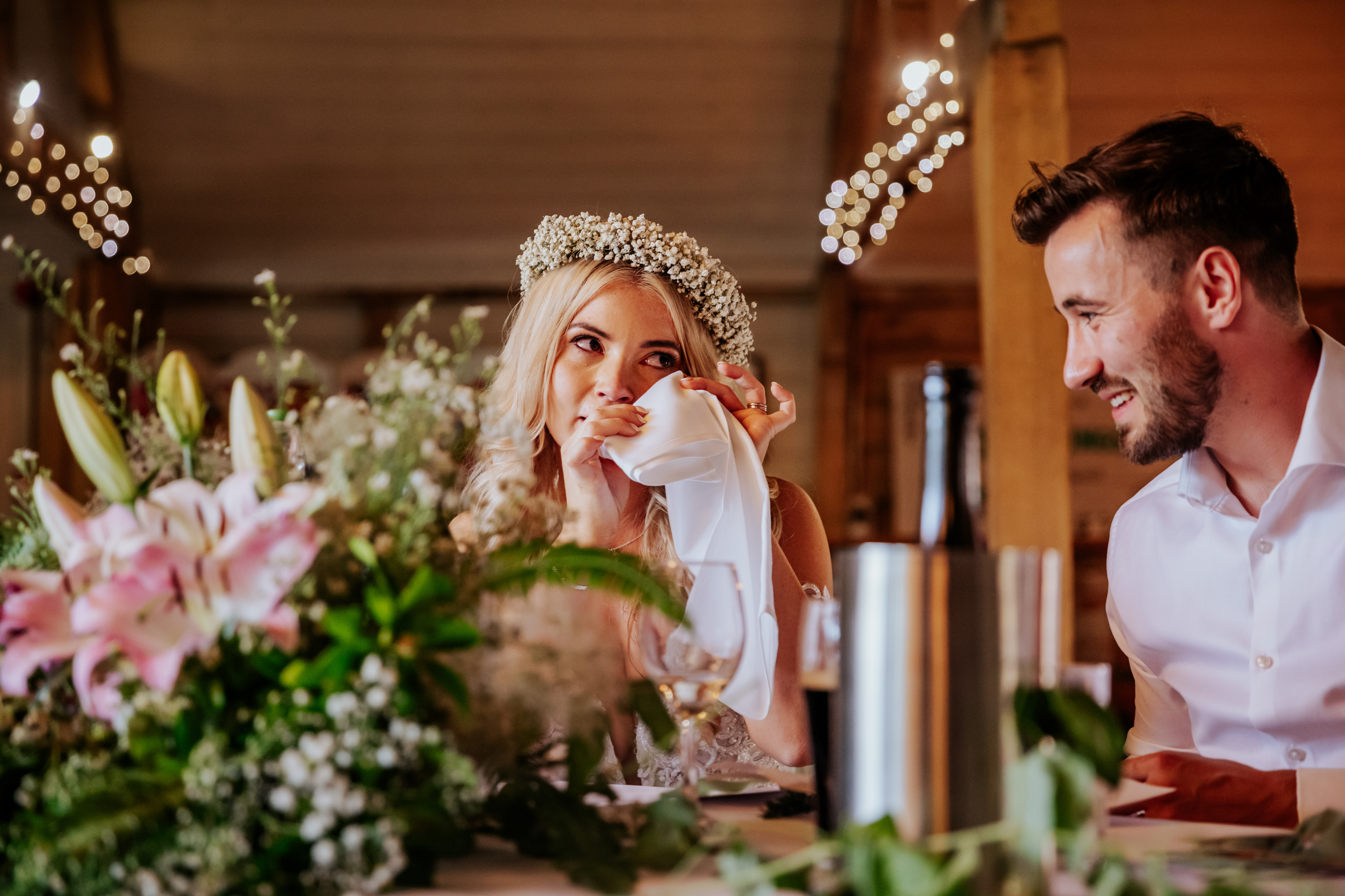 Bride wipes away her tears during speeches at Wellington Barn