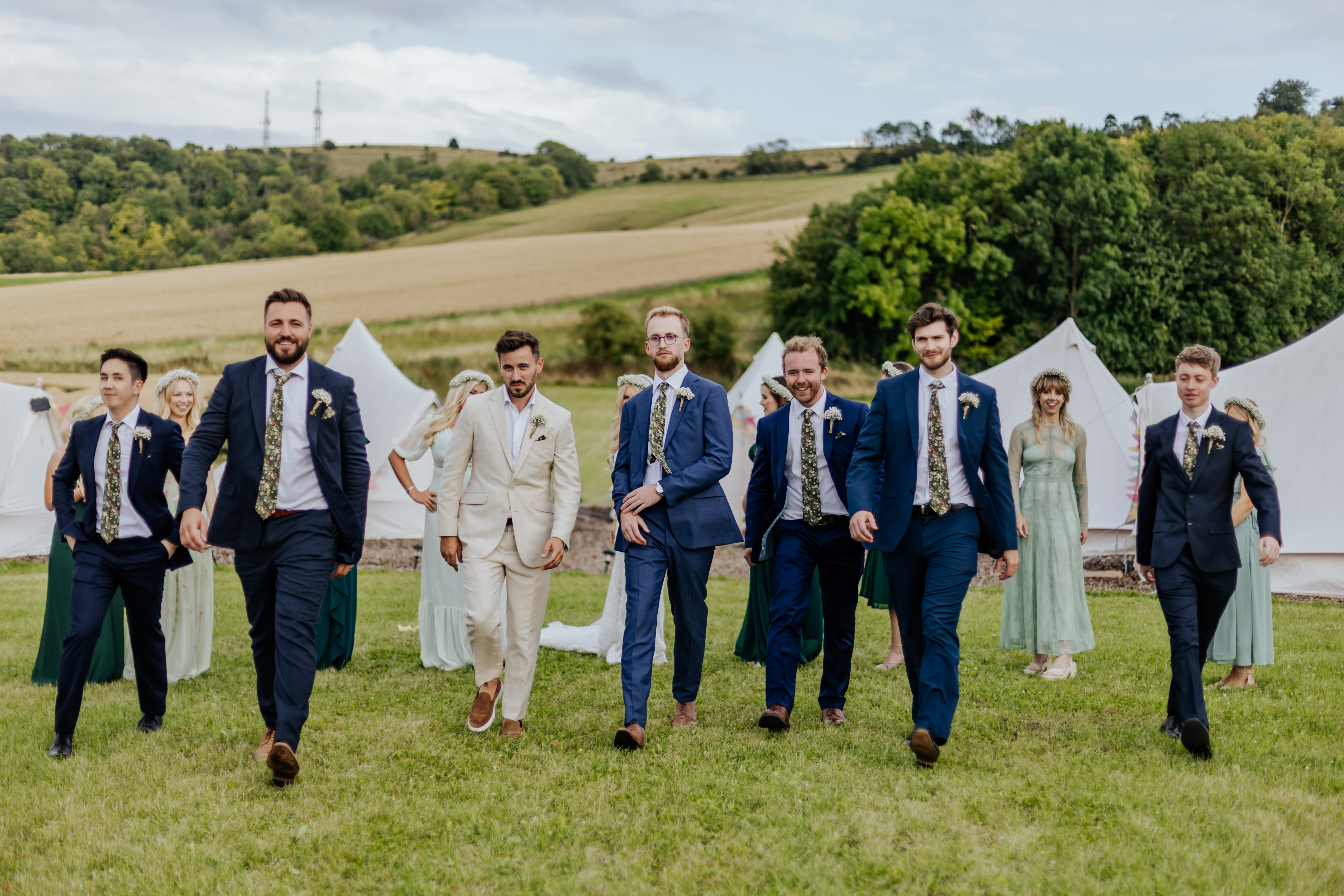 Groomsmen hit the catwalk outside of Wellington Barn's glamping pods